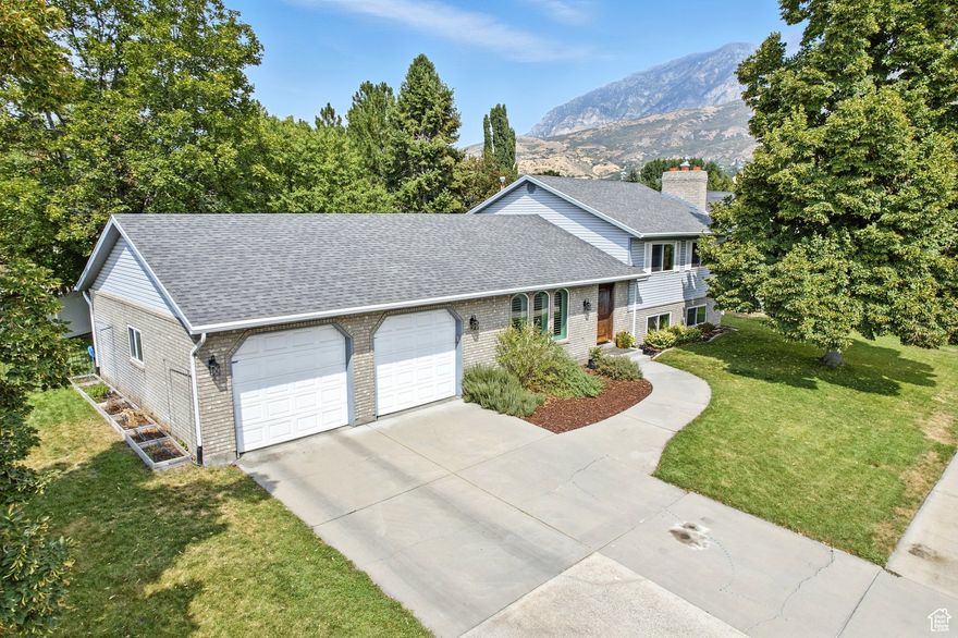Situated in one of Provo's most sought-after Riverbottoms neighborhoods, this updated 4-bedroom, 2.5-bath home has everything you're looking for. The open, light-filled floor plan features hardwood floors, triple-pane windows, and two inviting living areas-perfect for gathering or relaxing. The kitchen offers granite countertops, updated appliances, and serene mountain views. Recent improvements include a high-efficiency furnace, heat pump, tankless water heater, water softener, and radon mitigation system. Added conveniences include gutters with leaf guards, an EV outlet in the extra-deep garage, and a large sealed crawl space for storage. The backyard is designed for both play and relaxation, with mature trees, garden boxes, fruit trees, and a built-in trampoline. Ideally located near BYU, Provo Canyon, the Provo River Trail, Sundance Resort, and top-rated schools, this home offers unmatched convenience and lifestyle. Come experience Riverbottoms living at its finest-schedule your private showing today! Square footage figures are provided as a courtesy estimate only and were obtained from county records. Buyer is advised to obtain an independent measurement.