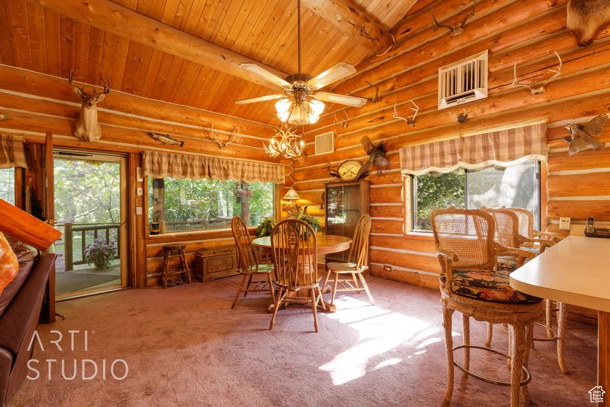 Charming Brookside Retreat on 0.76 acres. This log cabin home offers a cozy yet spacious layout perfect for relaxation and comfort. Sold fully furnished or negotiable. Propane heat, wood stove and evaporative cooler provide comfort all year. Open windows for fresh air with ceiling fans. Home features two bedrooms, a primary suite and another bedroom, with rustic charm and wood interiors. All of the comforts of home or a relaxing retreat with laundry area, ample storage spaces, and a quaint loft office or additional bedroom, perfect for work-from-home needs. The well-equipped kitchen has classic wooden cabinetry and modern appliances. The living area and dining space are surrounded with large windows that capture the lush outdoors. From the deck enjoy sights of wild turkey, fruit trees, birds and lush lawns. For your hobbies or work, you have a workshop equipped with electricity and another storage shed. Enjoy the Bubbling stream which is a natural water feature flowing by the eastern edge of the property. Veyo Culinary Water Assoc. one share transfers to new owner.