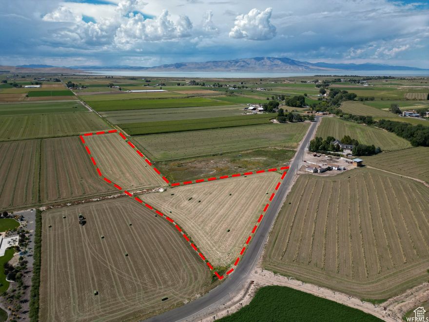 Discover 5.57 acres of prime land in Lake Shore's Eagle View Estates-perfectly situated for your dream home, hobby farm, or private retreat. This flat, partially fenced lot boasts stunning views of Utah Lake, the Wasatch Mountains, and Utah Valley. With 11 total shares of irrigation water and 1.5 shares from a newly-dug well, it's an ideal setup for agriculture or livestock. Zoned for both residential and agricultural use, with horse property designation and utilities nearby, including gas, power, and septic tank. In a greenbelt, so taxes are around $40/year! No HOA. Easy access to Spanish Fork and I-15. Buyer to verify all info. Acreage figures are provided as courtesy estimates only and were obtained from county records. Buyer is advised to obtain an independent measurement.