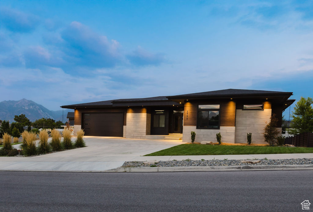 Modern Prairie masterpiece in South Jordan. This luxury 4 bedroom, 6 bathroom home offers over 5,400 total square feet, with main floor master living space. This residence is elegantly designed for entertaining and everyday living and has high ceilings and massive windows to fill the main level with natural light. Each of the 4 bedrooms have a walk-in closet and a private en-suite bathroom. The modern gourmet kitchen features an oversized 48 inch range top and premium built in appliances. The extra large island has an oversized workstation sink, a commercial ice machine, and a raised bar with a waterfall countertop. The floating deck and covered roof were engineered and built without using posts to provide unobstructed views of the mountains. The main garage is extra deep and extra wide with a 20x10 overhead door and the secondary garage provides an entrance close to the master suite. The space below the garage can be finished into a theater, home gym, golf simulator, workshop, or anything that fits your needs. Additional features: -Dual entrance extra wide circular driveway with room for 8-10 cars -Premium Pella Impervia fiberglass windows -Large built in closet in master suite with lots of shelves and soft-close drawers -Thermostat controlled heater in each bedroom -Snow-melt heated porch and walkway between garages -Pre wired for home audio and LED lighting in bedrooms, living room, and deck -Lower patio wired for hot tub -Natural Gas line for grill and space for an outdoor kitchen. Buyer to verify all information.