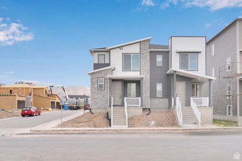 Photo of 12667 S GLACIER TRAIL LANE LN #125, Herriman, UT 84096 (MLS # 2108927)