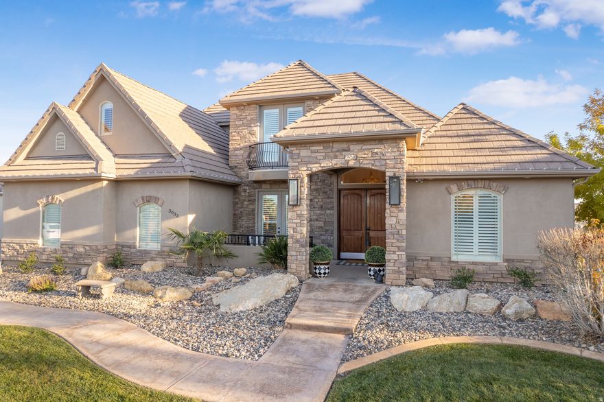 Located in Knolls subdivision this beautiful home sits on .40 size lot featuring unobstructed views of the Little Valley & Washington fields area. The home has an incredible updated kitchen with large pantry and island. Stunning new cabinets & appliances. Home has updated paint through out, lighting, gorgeous wood flooring & other features. Main level provides large primary suite w/ his & her closets, additional bedroom with bath convenient for guests, vaulted ceiling, great room, adorable laundry, office & flex space. Lower level offers a kitchenette, spacious gathering area, expansive storage & 3 beds with jack & jill bath. You will love the evenings sitting on the balcony or enjoying the lush green backyard. The large 3 + car garage with RV parking finishes off this ideal home.