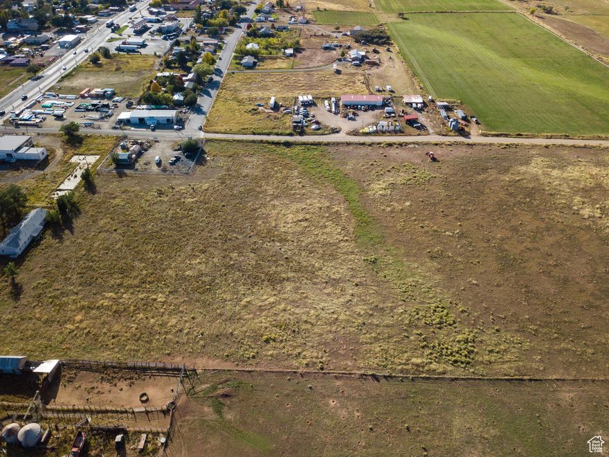 Presenting a remarkable opportunity to acquire prime land in the desirable Monticello area. This exceptional property boasts unobstructed, panoramic views of the surrounding mountain ranges, offering an inspiring backdrop for your future endeavors. The land features level, usable terrain, providing an ideal foundation for development or agricultural pursuits. Benefit from the convenience of existing utilities located at the street. Zoned AG/RES, this parcel accommodates horses, making it well-suited for equestrian enthusiasts or those seeking a rural lifestyle. 10 water shares included. Tracts A, B, C, D, and E are all parts of parcel #A33240305405 and will receive their own parcel numbers upon closing.