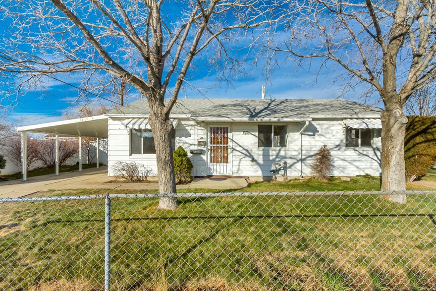Welcome home to this charming single-level gem in the heart of Tooele! Built in 1954, this home offers the perfect blend of character, comfort, and peace of mind. Big-ticket updates are already done for you, including a newer roof and HVAC system, updated PEX plumbing, and a replaced sewer lateral-making this an ideal choice for buyers who want to move in with confidence.  Inside, you'll find three cozy bedrooms and original hardwood floors that add warmth and timeless appeal. The pride of ownership is evident throughout, creating a space that feels both inviting and well cared for. Outside, enjoy a shaded, easy-to-maintain yard-perfect for relaxing evenings, pets, or weekend gatherings.  Outdoor lovers will appreciate the close proximity to Settlement Canyon and Deseret Peak Wilderness, while the convenient location near schools and downtown Tooele makes everyday living a breeze. A wonderful opportunity for first-time buyers or anyone looking for a well-kept home with lasting value. Square footage figures are provided as a courtesy estimate only and were obtained from county records. Buyer is advised to obtain an independent measurement.