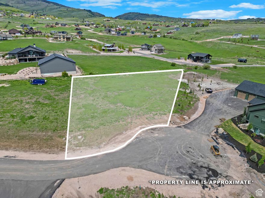 Nestled in a serene subdivision, this lot offers panoramic vistas of Bear Lake's turquoise waters and the surrounding mountains. With direct access to Fish Haven Canyon, outdoor enthusiasts can enjoy hiking, biking, and exploring the nearby trails. Come take a beautiful Spring drive to see all this lot has to offer. Sellers also own the lot to the West of this. Please call for details. This lot has paved roads, private beach access. It is a sloped lot. The HOA fees are low with sewer, power and water stubbed.  Located in a Cul-de-sac with BREATHTAKING VIEWS OF BEAR LAKE!!