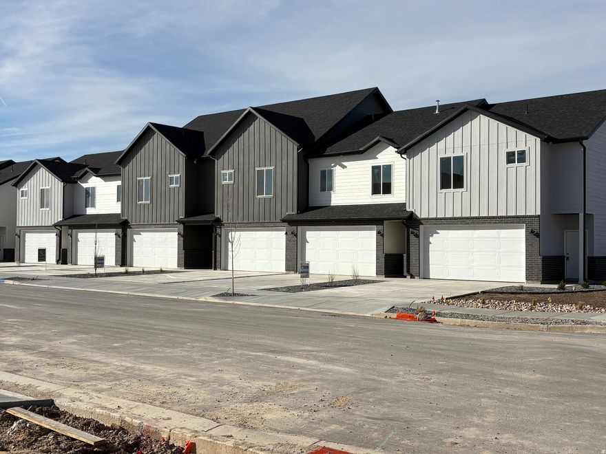 MOVE IN READY!!  Welcome to our Vista Floor Plan - Our center-unit home designed to bring light, openness, and sophistication to everyday living. With taller ceilings that fill the space with natural light, this floor plan transforms 1575 sq.ft. into an airy, uplifting retreat. Featuring 3 bedrooms, 2.5 baths, and a 2-car garage with full driveway, The Vista blends modern finishes with thoughtful design: quartz countertops decorative tile backsplash, luxury vinyl plank flooring and a primary suite that welcomes you to airy tranquility and elevated comfort (with 10' ceilings on the second level with 8' doors). Whether you're entertaining friends or savoring quiet moments. The Vista elevates your living experience - where every day living feels bright, expansive, and effortlessly modern. Nestled Away From The Hustle & Bustle, This Community Offer The Perfect Balance Of Tranquility & Convenience!
