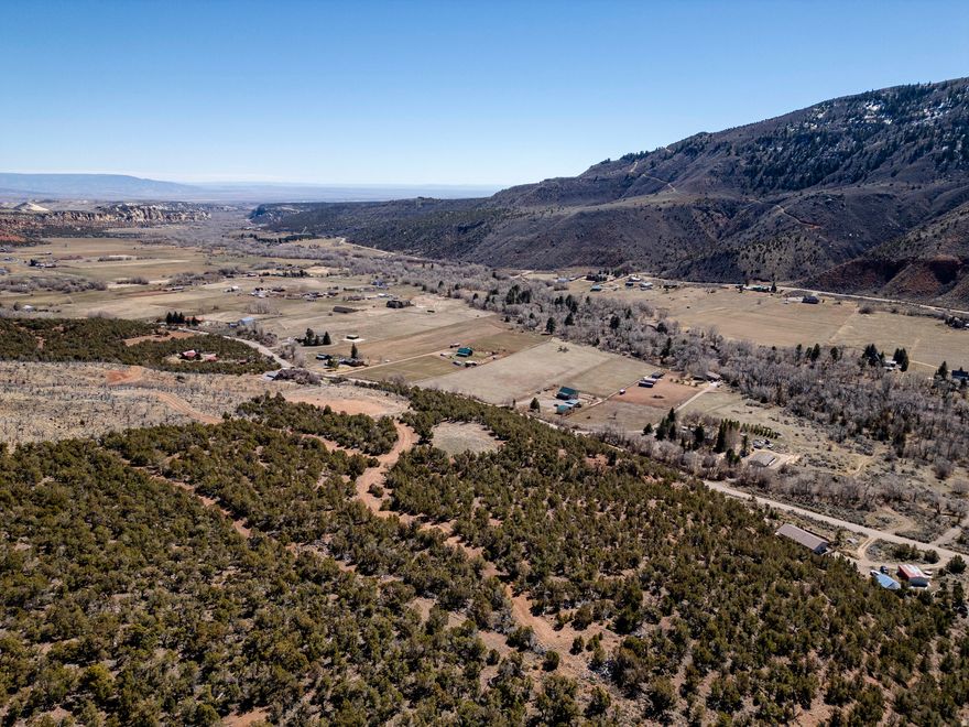 Panoramic views, privacy, and endless potential-this stunning Dry Fork 10 acre property in Vernal, Utah is the perfect canvas for your dream retreat. With a Well already in place, it offers a rare opportunity to build in one of the area's most scenic and peaceful settings. A privately maintained road easement ensures easy access, while two previously leveled building areas provide flexibility for your ideal layout. Whether you're envisioning a weekend escape or a custom home surrounded by nature, this property is ready to bring your vision to life. Buyer to verify all information. Information provided as a courtesy only and not guaranteed.