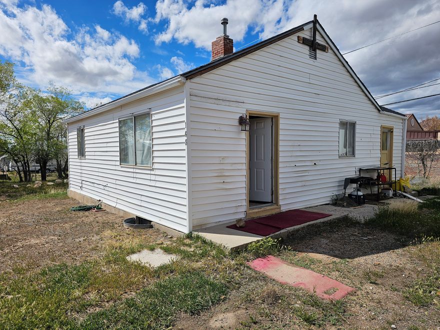 Handyman special with great potential in East Carbon! This 2-bedroom, 1-bath home is the perfect opportunity to finish remodeling and build instant equity. Major updates have already been started, including new plumbing and a new 220-amp electrical service. With a little TLC and your finishing touches, this property could truly shine. Ideal for investors or buyers looking to customize a home to their own style-all at an attractive price point. Don't miss your chance to turn this into a great investment or cozy residence!