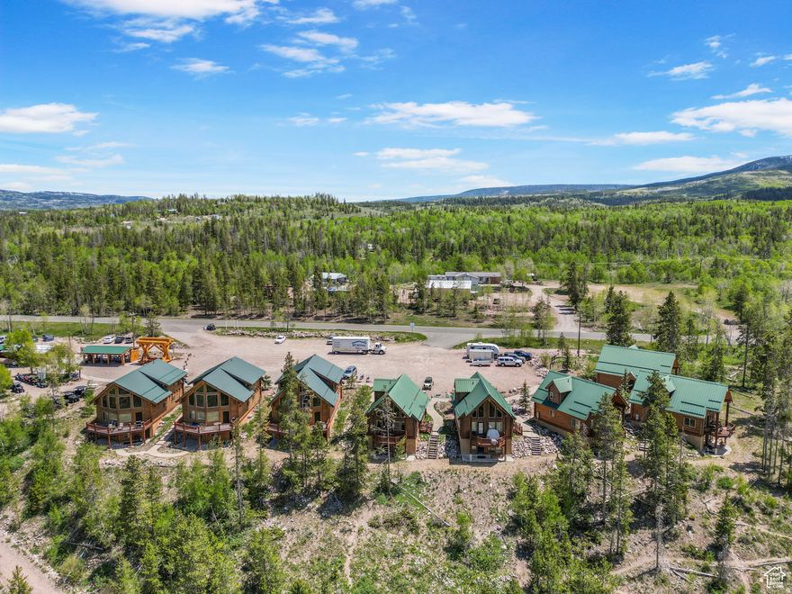 Mountain Retreat FURNISHED Cabin at Bear River Lodge  Income-Producing Getaway, Your Cabin Home Awaits. Experience the perfect blend of mountain luxury, adventure, and income potential at this stunning cabin located in the iconic Bear River Lodge Resort along scenic Mirror Lake Highway in the Uinta Mountains. Ideal as a personal retreat or high-performing short-term rental, this property truly offers the best of both worlds. Enjoy panoramic mountain views from your private deck, plus access to a heated swimming pool, two hot tubs, two private fishing ponds, and nearby lakes and streams known for exceptional fishing. The area offers year-round recreation including hiking, hunting, UTV riding, and snowmobiling, with on-site rentals available. A convenient on-site restaurant and general store add to the comfort and accessibility. The cabin is completely furnished and turnkey, featuring a warm, inviting interior designed for comfort and relaxation. Currently operating as a successful Airbnb and Vrbo rental, it offers strong income potential in one of Utah's most popular recreational destinations. Located in the heart of the Uintas on Mirror Lake Highway, this is more than a cabin - it's your gateway to mountain living and a profitable investment opportunity. Your cabin home awaits. Square footage figures are provided as a courtesy estimate only. Buyer is advised to obtain an independent measurement.