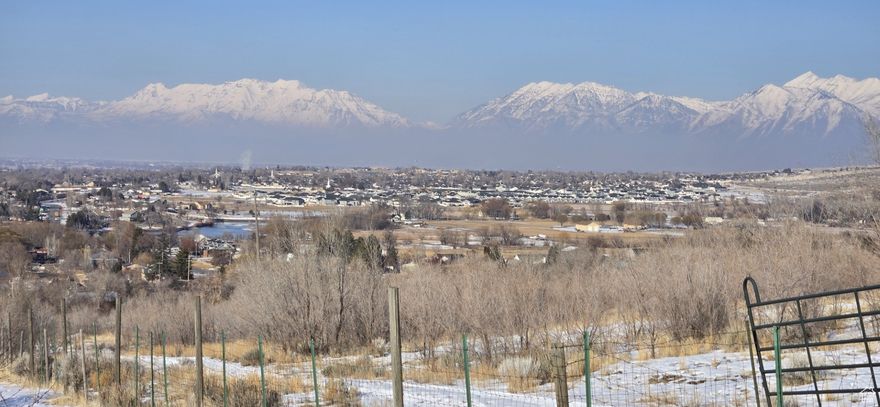 Price just reduced $500,000! Beautiful area with spectacular views and a Developers dream! Currently in Residential/ Agricultural (R Ag) zoning and can be subdivided. Home has main floor living and has a walkout basement, laundry and kitchenette. Great possibility of in-law or accessory apartment. Comes with two wells and a spring on the property. Some of the most beautiful views in Utah County! Additional 53.58 acres will be available soon. MAKE SURE YOU CHECK OUT THE DRONE VIDEO OF THIS AWESOME PROPERTY! Click on the TOURS at the top of the page, or copy and paste into your browser.   https://drive.google.com/drive/folders/1QsjkWZ051CmJ-C554J3L1GZsu5fHiA9n?usp=sharing