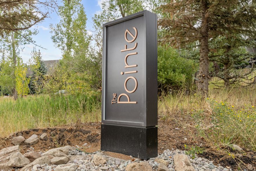 Welcome to The Pointe at Wolf Creek, a newly built condo community that blends mountain serenity with modern finish. This upper-level unit overlooks the 11th and 12th fairways of the Wolf Creek Golf Course and features a private balcony with stunning views of Powder Mountain and golf course views. The spacious 2-bedroom, 2-bath layout offers open-concept living, vaulted ceilings, and high-end finishes throughout. Zoned for nightly rentals, this property is ideal for a personal getaway or investment.