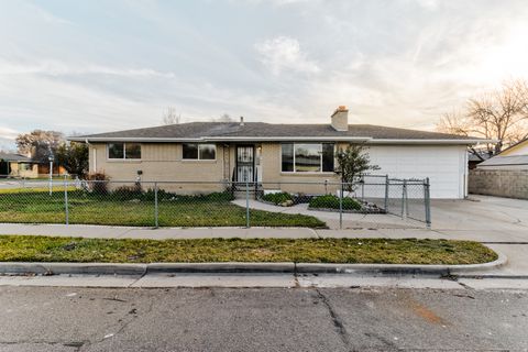 Photo of 2045 W BOWLING AVE, Taylorsville, UT 84129 (MLS # 2126381)