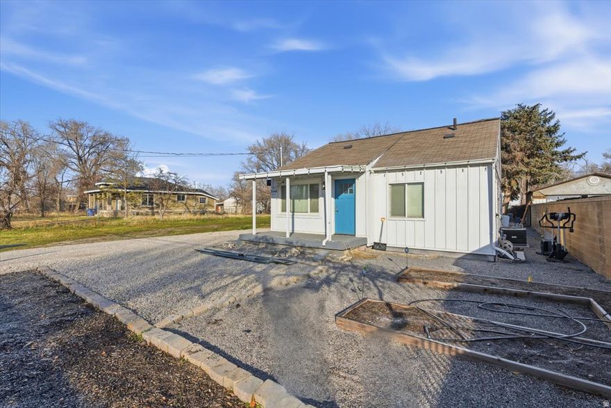 This home is a must-see! Step inside to a welcoming living space that flows seamlessly into the kitchen, featuring granite countertops and a warm, inviting layout. The home offers updated flooring and paint. Down the hall, you'll find two well-sized bedrooms and a full bathroom, while just off the kitchen is a spacious laundry room that also includes a convenient  bathroom. Upstairs, two cozy nook-style bedrooms provide flexible space, perfect for a home office, playroom, or guest area. The property also includes an additional .15 acres with parcel (#15-22-451-021), offering added space and potential to build another property.   Square footage figures are provided as a courtesy estimate only and were obtained from county records.  Buyer is advised to obtain an independent measurement.