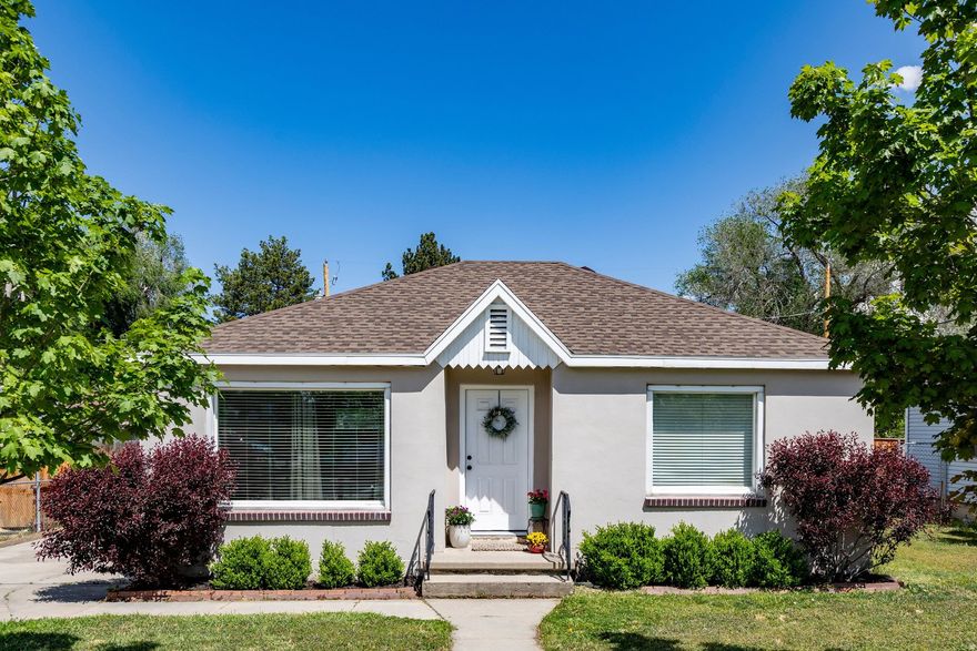 This charming and updated South Salt Lake cottage offers a comfortable and thoughtfully designed living experience, ideally located just minutes from Sugar House Park, downtown Salt Lake City and the University of Utah. The home has been carefully renovated with attention to detail, blending modern conveniences with a functional layout suited for everyday living. Natural light enhances the inviting interior, where the front sitting room with updated LVP flooring flows effortlessly into the kitchen and adjoining laundry and mudroom area. The well-appointed kitchen features custom shaker-style cabinetry, stainless steel appliances, quartz countertops and seating for two.This home includes two bedrooms and a full bathroom, providing a practical and efficient layout. Outdoors, a private patio and park-like yard create a welcoming setting for entertaining or quiet enjoyment, while a large outbuilding offers ample storage space and flexibility. This updated cottage presents a wonderful opportunity to own a well-cared-for home in a convenient and increasingly desirable Salt Lake City location.