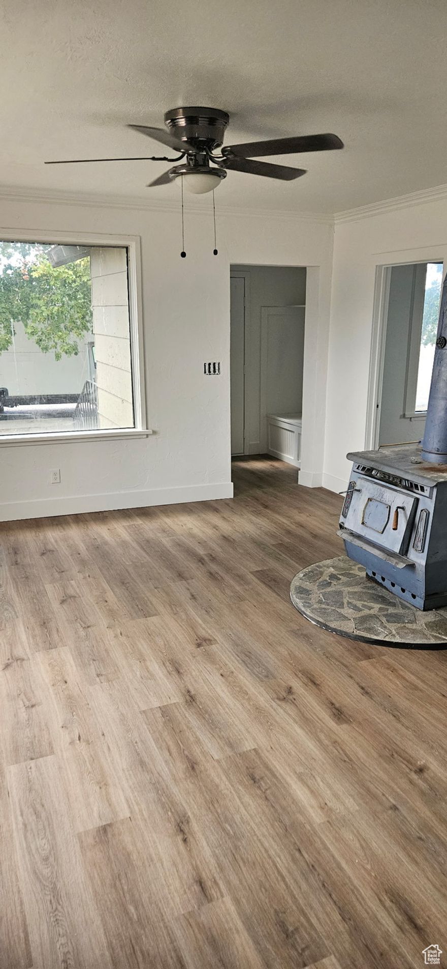 Recently reovated home with new flooring, paint, etc. Builder in the process of painting the exterior and finishing some interior items. Egress window being installed in the basement.