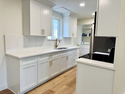 Tiny photo for 105 E WILSON RD, North Salt Lake, UT 84054 (MLS # 2142602)