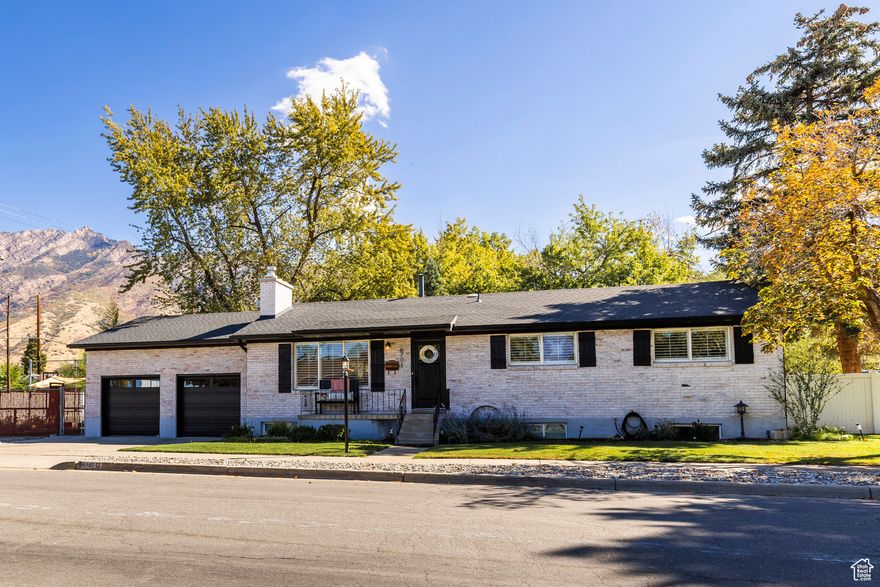Discover the rare combination of character, space, and unbeatable location in this eclectic rambler that captures the essence of simpler times. Nestled at the base of the majestic Wasatch Front, this distinctive home offers a lifestyle that's increasingly hard to find in Salt Lake. Step into a residence that tells a story - one of craftsmanship and timeless appeal. The home's unique, eclectic style evokes charm and character that cannot be replicated, while offering modern functionality for today's living. With an impressive 4 bathrooms total - 2 conveniently located on the main floor and 2 in the basement - this home provides exceptional convenience and flexibility for families or multi-generational living. NEW ROOF within the last few years. The property features a separate basement entrance, opening up exciting possibilities - perfect for a mother-in-law apartment, a rental income opportunity, or a multi-generational living arrangement. With 2 full bathrooms already in the basement, complementing the 2 bathrooms on the main level, the space is ideally configured for independent living. This flexible space adds tremendous value and versatility to an already exceptional property. What truly sets this home apart is the RARE, LARGE LOT - a commodity that's become increasingly scarce in this desirable Salt Lake area. The expansive grounds include an established garden area, offering immediate enjoyment for green thumbs and nature enthusiasts. Beyond that, the generous lot size provides endless opportunities to expand, develop, and customize the land to match your vision and imagination. **Location, Location, Location!** Enjoy the perfect balance of peaceful mountain living with easy access to everything that makes Utah special. You're just a short drive from world-class Utah ski resorts, the first-class Salt Lake International Airport, and vibrant downtown Salt Lake City. Whether you're heading to the slopes, catching a flight, or exploring urban amenities, everything is conveniently within reach. Four total parcels are included with the sale-buyer to verify all info.