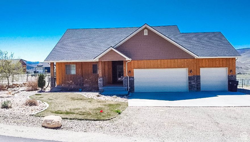 Looking for the perfect property outside the busy city limits? This is the home you have dreamed about! It is so amazing how one property can have so many incredible features! For starters, this horse property sits on .81 acres and features 5 bedrooms, 3.5 baths, Mother in-law apartment with its own entrance, plenty of cold storage, dog run and a 3 car garage with extra depth. Also Includes a generator as home is completely wired for generator use as needed. Also, call it what you want: this 32'x57' barn, shop, detached garage or shed, comes fully wired with 220 outlet and separate breaker box that is needed for welding etc. The deck provides breathtaking mountain views. HOA is $25 per month. Seller will pay $10,000, with a full price offer, to be used toward closing costs and/or rate buy down. Schedule your showing today!