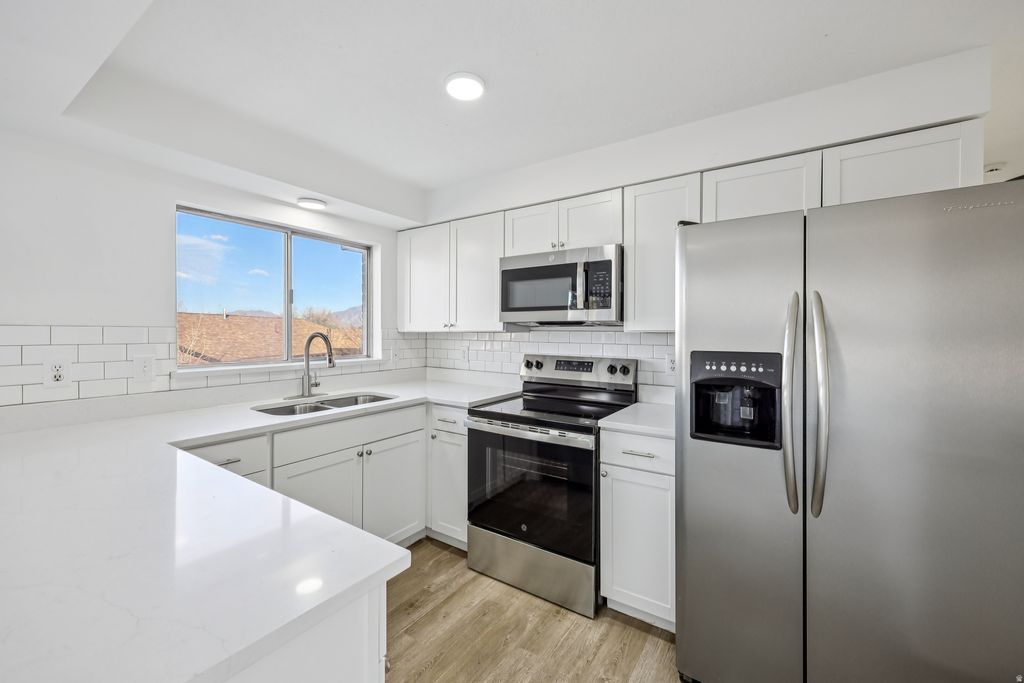 Photo of 3020 W ROSA VISTA DR, Taylorsville, UT 84129 (MLS # 2138909)