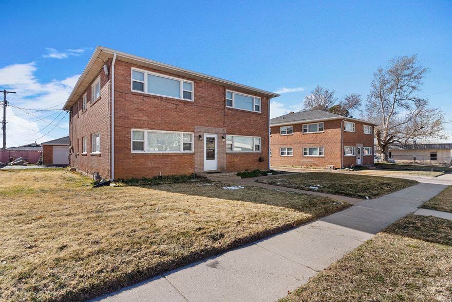 This offering includes two fourplexes (8 units total). Each unit features well-maintained hardwood flooring, spacious living areas, and generously sized bedrooms. All units have updated windows, and the roofs on both buildings have been replaced. The property boasts a strong rental history and is 100% occupied at the time of listing. Each unit includes a 1-car garage and radiant heat. A shared coin-operated laundry is located in the basement and available to all residents. The sale includes Parcel #12-003-0062 and Parcel #12-003-0061.