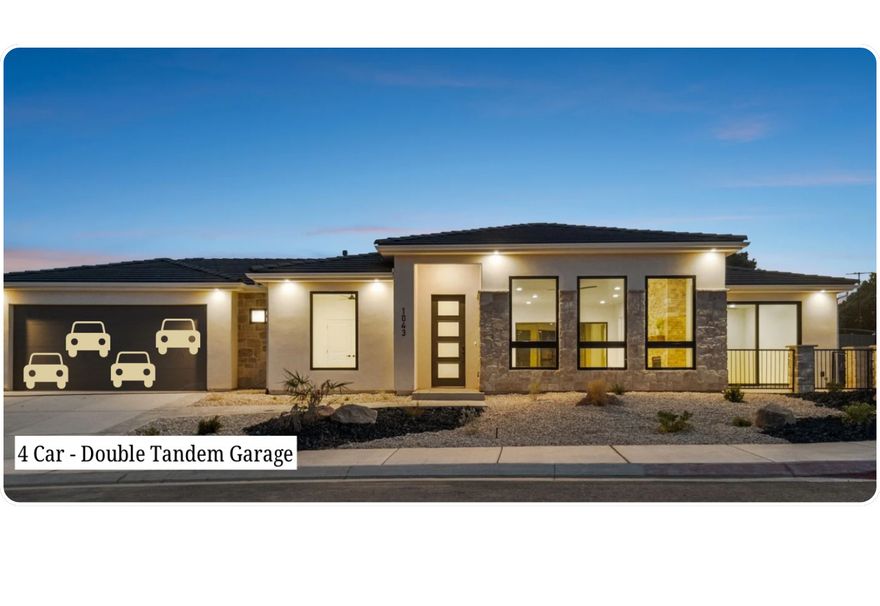 **DO NOT MAKE YOUR HOME PURCHASE WITHOUT SEEING THIS ONE IN PERSON** You won't find another home with a massive four car garage and stunning views that will NEVER be obstructed.  Nestled along the breathtaking ridges of the Virgin River, this exquisite Madsen Homes, custom residence was designed to capture the stunning panoramas of Hurricane Valley. Located in the beautiful Falcon Ridge community, this home is truly a must-see.  Expansive windows and 8' sliding doors fill the home with natural light, offering breathtaking views from the Owner's Suite, Living Room, an additional bedroom, and the charming front courtyard off the Owner's Suite.  The spacious great room and kitchen are ideal for both everyday living and entertaining, featuring Frigidaire Professional Stainless Appliances, including 33'' Single-Door, side by side Refrigerator and Freezer,elegant quartz countertops, and knotty alder cabinetry throughout. Elegant gold and black fixtures add the perfect final touch. Step outside to a fully landscaped backyard with a covered patio, creating the perfect setting for relaxing evenings and outdoor gatherings.   Th at 4 Car (Double Tandem) Garage offers plenty of room for your outdoor toys that definitely won't go unused. Falcon Ridge is only 30 minutes from Zion National Park and St. George, and only 15 minutes from Sand Hollow and Quail Creek Reservoirs, several world class golf courses, and unlimited hiking, biking, fishing and boating options. Fire up your UTV and make the quick drive from home to miles of dunes and trails. This property is the perfect blend of tranquility and adventure. It's not just a home - it's a lifestyle.    All information believed to be accurate and offered as courtesy only. Buyer to verify all