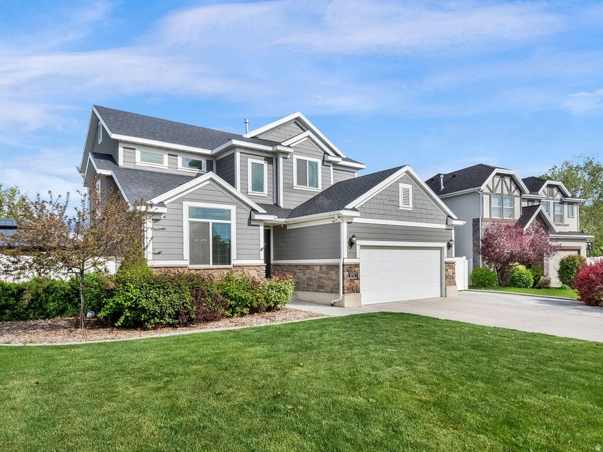 PRICE IMPROVEMENT!! Get it while you can! Imagine stepping through the front door into a grand, light-filled entry where natural light carries from front to back and the home immediately feels open, warm, and inviting. The main level is designed for everyday comfort and easy gathering, with soaring ceilings, warm wood flooring, and an effortless flow into the kitchen, dining, and living spaces. This home checks all the boxes! Picture mornings in the bright white kitchen, evenings gathered around the dining table, and cozy nights relaxing on the sofa in the spacious family room. The finished basement gives you even more room to live - movie nights, workouts, game days, guests, Mother In Law Apartment or a simply quiet place to unwind. At the end of the day, escape to the primary suite with vaulted ceilings, a beautiful accent wall, dual vanities, soaking tub, and walk-in shower. Outside, enjoy a fully fenced backyard made for entertaining with a patio, fire pit area, covered hot tub space, and a yard big enough to play catch in! Set on a cul-de-sac in an excellent neighborhood, just walking distance to the community pool, three parks, legacy trail and Odyssey Elementary - this is the kind of home where comfort, connection, and lifestyle all come together.