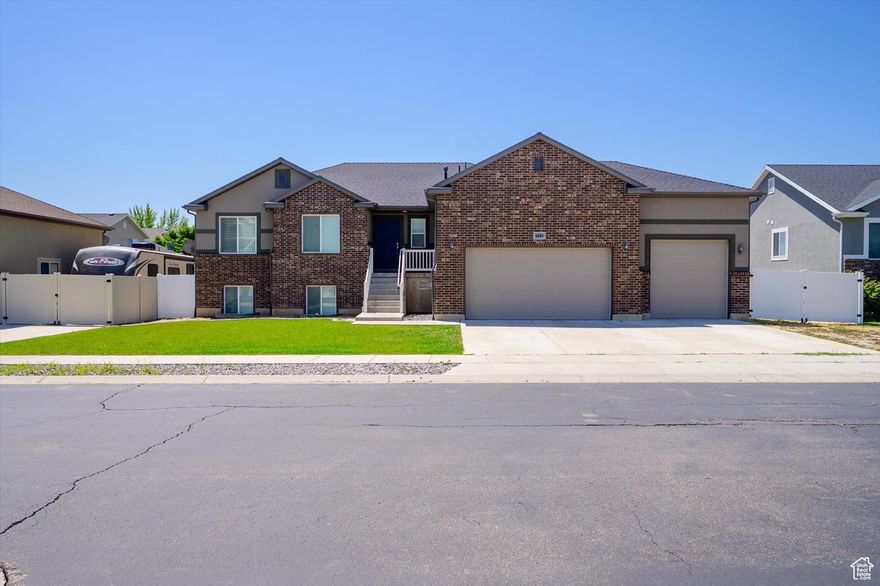 Discover this beautifully updated 5-bedroom, 3-bath rambler ranch located in a desirable neighborhood just minutes from top-rated schools. This spacious home offers a bright, open-concept floor plan with modern finishes throughout. The large kitchen flows seamlessly into the dining and living areas perfect for everyday living and entertaining. Downstairs, you'll find a fully finished basement with a cozy family room and a custom wet bar with a theather room wired for a projector, ideal for gatherings.  Move-in ready with room to personalize don't miss your chance to own this exceptional property!