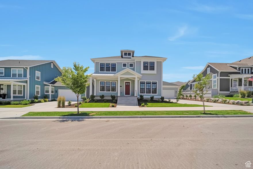 Welcome to this beautifully designed home that combines modern luxury with farmhouse styling, offering a unique and inviting living space. This mix of styles creates a warm and comfortable atmosphere while incorporating contemporary features for a fresh and elegant look. A welcoming entry reveals views of the spacious great room, dining area, and impressive high ceilings. This stunning home boasts a grand chef's kitchen, fully equipped with high-end stainless steel appliances, 42" built in monogram fridge, 36 inch range, wall mount oven and microwave, custom cabinetry, and a large center island. The dining area is graced by large farm style windows providing an abundance of natural lighting. Expansive great room features a striking fireplace as its centerpiece, creating a warm and relaxing environment. Generously sized master bedroom with stunning views of the surrounding landscape. Luxurious master bathroom highlights an elegant soaking tub, walk-in shower with dual mounted shower system, two large walk-in closet with organizers, dual-sink vanity, full length mirror, and a private water closet. Spacious secondary bedrooms feature ample closets.The fully finished basement offers two additional bedrooms, bathroom, and a versatile space that can be transformed into a home theater, game room, or additional living area. An impressive extra-long driveway leads you to an oversized garage with ample space for up to four vehicles, making it ideal for hosting guests or accommodating a growing family. This luxury farmhouse offers the perfect combination of sophisticated living and country charm.