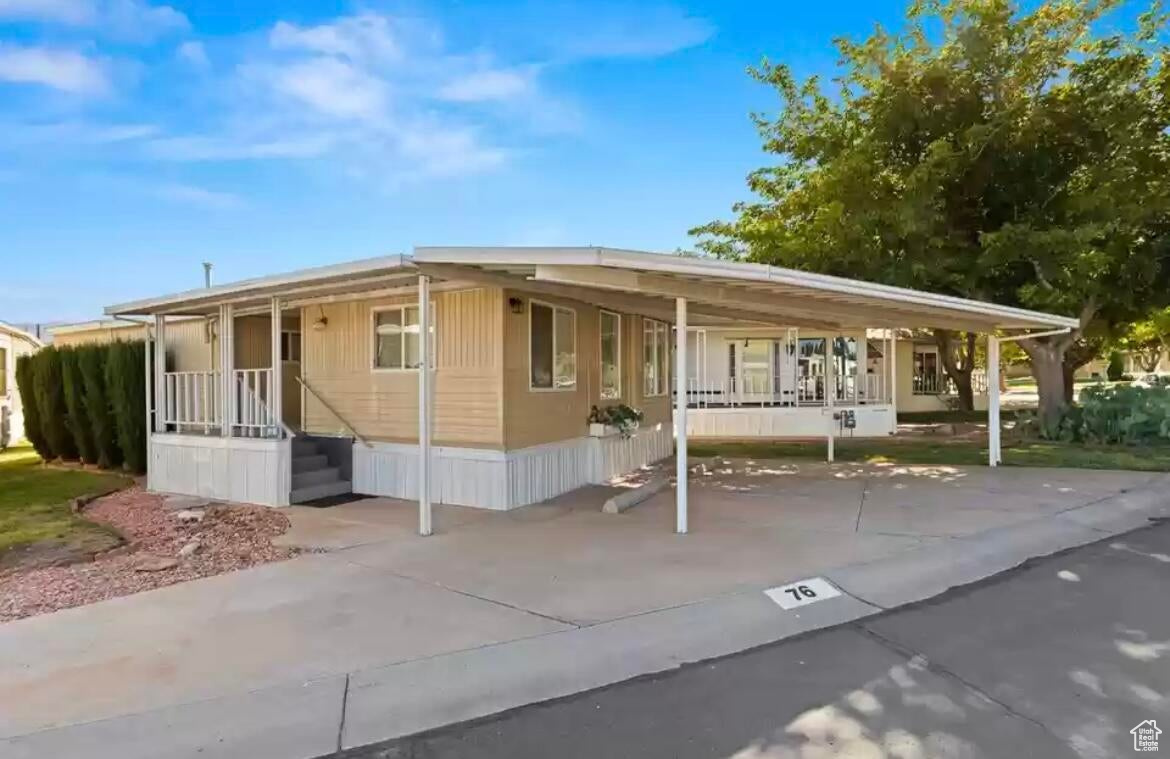 This spacious 2 bedroom home has 1.5 bathrooms, a new metal roof, a 2-car carport, 8 x12 foot shed/workshop, covered front deck and large covered back deck with view. The kitchen includes side-by-side fridge, ceramic cooktop stove and above-stove microwave combo and a dishwasher! There are two spacious mirrored double closets, several built-in drawers and built-in desk in the master bedroom. The bathtub/shower is equipped with a grab rail. Laundry room/half bath includes smart HE washer and dryer, linen closet, many cupboards and long counter. The vaulted ceilings have sky view windows and plant shelves. All appliances stay which includes gas grill on the back patio. The 8 x 12 shed/workshop is wired, has built-in cabinet, workbench and shelves and two overhead lights, great for projects or storage. Buyer to verify all information.