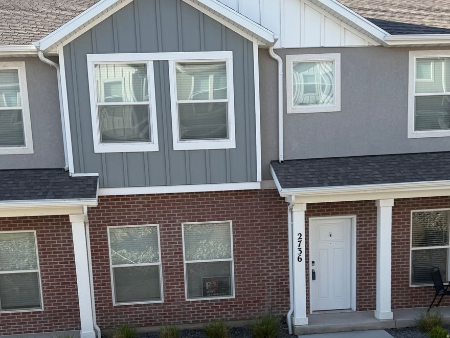 Welcome to this beautifully maintained 3-bedroom, 2.5-bathroom townhome located in the highly desirable Juniper Springs community in Eagle Mountain, directly across from Hidden Hollow Elementary. This home offers a bright and open-concept layout with modern finishes throughout, including quartz countertops, upgraded cabinetry, LVP flooring, and a spacious kitchen island that's perfect for both everyday living and entertaining. The main floor is filled with natural light and provides a comfortable, functional living space. Upstairs, the large primary suite features dual sinks, a generous walk-in closet, and a private retreat feel.  Enjoy the convenience of an attached garage, nearby parks, scenic walking trails, and a growing community with a welcoming neighborhood feel. This home combines thoughtful design, quality finishes, and an excellent location. Square footage figures are provided as a courtesy estimate only and were obtained from county records. Buyer is advised to obtain an independent measurement. Buyer and buyer's agent to verify all information.