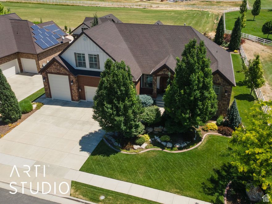 Incredible home located on premier Heritage Drive in the desirable Farr West Farms subdivision! This stunning six bedroom Rambler sits west facing and boasts over 5,300 square feet of spacious living. The main level of the home features beautiful hardwood floors, vaulted ceilings, and an open floor plan with unobstructed views of the mountains. Fireplaces both up and down. Separate thermostats for all three levels. All closets have had custom storage and organization systems installed to maximize space and organization. Daylight basement is fully finished with a new kitchen and laundry room. It also has a walkout to a large patio and separate entrance to the garage. Massive deck off the dining area that overlooks the beautiful mountain views and comes with a spiral staircase that accesses the patio below. The impressive yard was designed with beautiful landscaping and a firepit to entertain. Oversized garage with a separate garage door that enters the backyard. Impeccably maintained home! Don't miss out on this beautiful property!