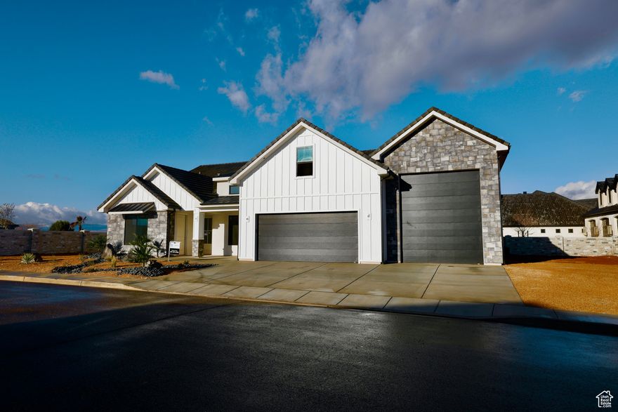 \4 bedroom (one is a casita) Huge rv garage. Hawkeye Point in Washington City is close to EVERYTHING!  Just minutes from Downtown St. George and Tuacahn entertainment to the west and Sand Hollow and the sand dunes to the east.  This quiet, scenic community is perfectly located in the middle of it all.  Whether it's hiking, biking, camping, water and off-road recreation, theater, shopping and dining or simply peaceful scenic walks, there is something for everyone at Hawkeye Point.  Our modern floor plans with RV garages are perfect for the on-the-go lifestyle.  Our standards include upscale kitchens, open layouts, with ample room for entertaining and a sophisticated owners suite with spa-inspired bathroom. This home features a casita, and  The RV Garage is 16x53 and the door is 12' x 14' High. 16' ceiling height in rv garage owner agent