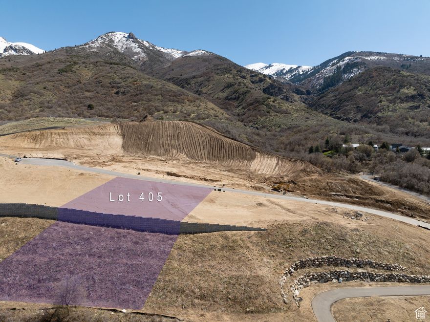 Incredible  view lot on the west side of the street with back yard retaining wall already built.  Hiking and biking on exclusive access to trails.  10 minutes to Station Park and Frontrunner Station, 20 minutes to ski resorts, lakes, and other recreational venues, easy access to HWY 89. Bring your own builder or use one we recommend. Other lots available. See listing agent for details.