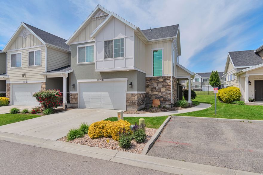 OPEN HOUSE Saturday, May 16th from 11am - 1pm. Step into this stunning end-unit townhome in the heart of Riverton, where an inviting entry and an abundance of windows fill the space with beautiful natural light. The spacious island kitchen is perfect for entertaining, while the large primary suite offers a true retreat with a separate soaking tub, walk-in shower, and double vanity, as well as a walk-in closet.  Freshly painted interiors, new carpet, and a water heater less than three years old add modern comfort and peace of mind, while the included washer/dryer makes this home truly move-in ready.  Unwind in the evenings on your private patio and enjoy the peaceful surroundings. Ideally located near Riverside Golf Course and Riverton City Park, with quick freeway access to I-15 and Bangerter Highway, you'll have shopping, dining, VASA, and entertainment just minutes away. Homes in this sought-after community sell fast-don't miss your chance to own in this quiet neighborhood with low HOA fees!
