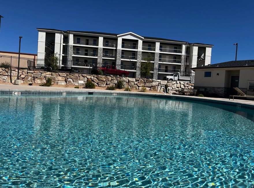 Brand new and never lived in and qualifying for Utah Housing's $20,000 first time buyer funds.  This condo is right across from the pool at the top of the Coral Canyon area of Hurricane.  5 minutes to Washington, 10 minutes to St. George.  Pool, pickleball, and AFFORDABLE.  Winter home, rental, (long term only), or owner occupied unit.  This pricing reflects a rentable unit.  Owner occupied is $10,000 less.