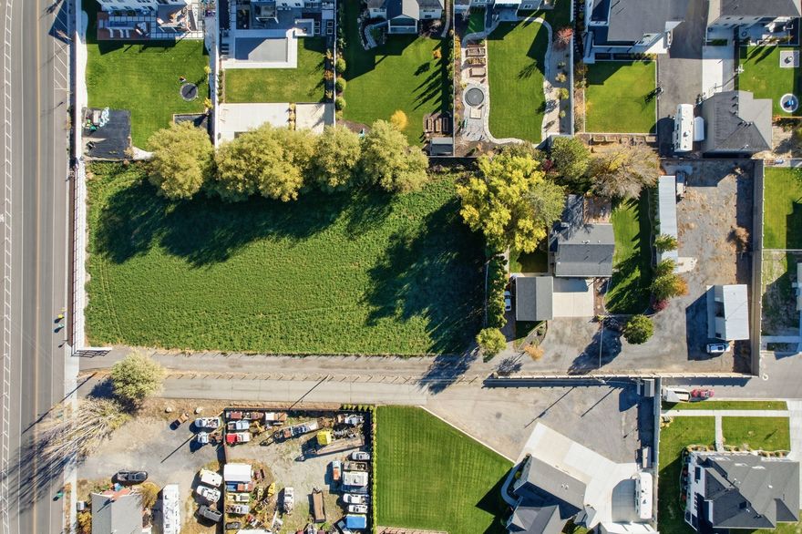 If you're looking to be in the heart of Lehi but need a little elbow room, look no further! Come and see this 1.98 acre agricultural property and charming ranch style home! The property includes beautiful mature trees that add privacy, irrigated alfalfa field, well/well rights, animal rights, and multiple out buildings and facilities to house livestock or store equipment, ATV's, and RV's. There are FUTURE DEVELOPMENT POSSIBILITIES as well!