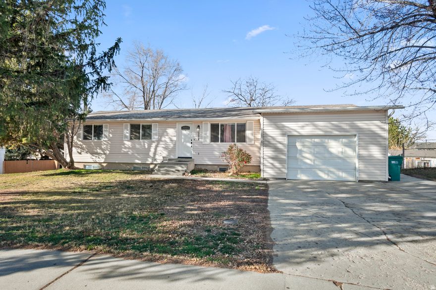 Delightful Orem Rambler with a Grandfathered legal accessory apartment.  Use the entire home, or rent a level and get help with the mortgage.  This isn't just a home  it's a strategic asset for comfort and financial flexibility.   The main level features 3 bedrooms with 1 full bath, a bright, spacious kitchen, and dining area with beautiful views of Utah Lake and the mountains.  Stainless steel appliances, large windows with attached extra-tall and spacious garage.  The lower level features an open kitchen with recessed lights, large family room area, large windows bringing in light, and a private back patio for indoor-outdoor living.  Both levels have separate laundry hookups.  Don't overlook the large .30 acre.  Placing the home in a gorgeous setting that is fully fenced with large mature trees and plenty of space for fun and private outdoor living.   Walking distance to UVU.  Close to direct line to BYU and all of the best amenities. Come and See! Agent related to Seller.