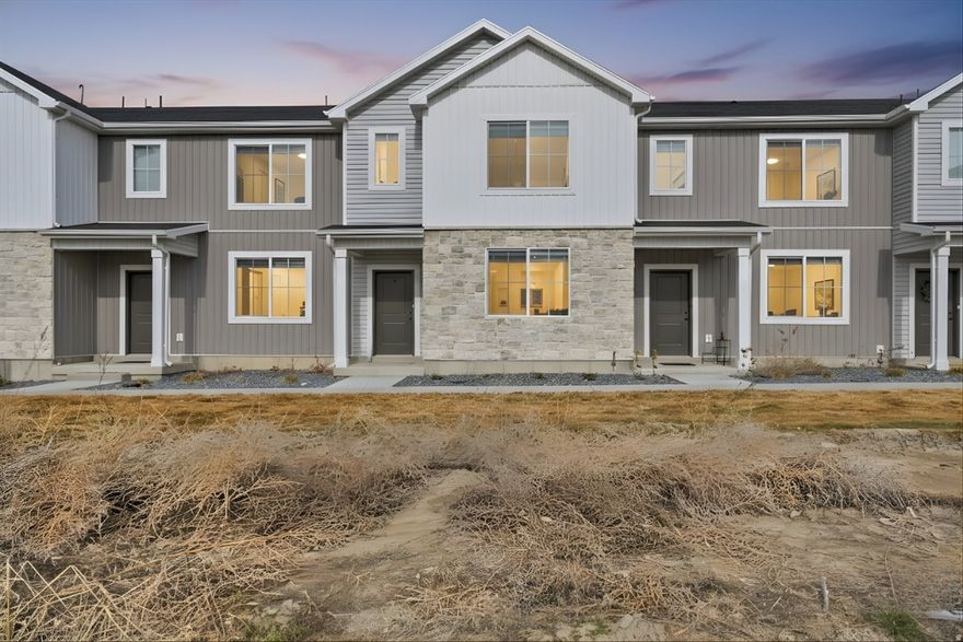 Discover modern, low-maintenance living in this beautifully designed 2024 townhome. Enjoy the convenience of a prime Cache County location near local schools, parks, and everyday amenities while benefiting from brand-new construction quality and style.