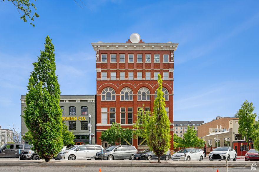 Experience a stunning renovation in the iconic Broadway Lofts in the heart of downtown Salt Lake City. A true luxury loft with nearly 2,000 square feet and incredible city and mountain views, this loft will provide an inspiring welcome at each arrival. Stunning gourmet kitchen with gray lower cabinets, horizontal wood grain upper cabinets, quartz countertops with waterfall edge and high end appliances including Subzero refrigerator, Wolf gas range and wall oven. Concrete construction and end walls aid in creating a quiet space. Beautifully remodeled spa-like baths. Walk-in closet with built-ins. Hardwood floors throughout. On demand water heater, reverse osmosis system plus building provides soft water. Gracious common areas with firepit, BBQ and seating areas for relaxing. Gated community with secured parking(space #33) and on site storage space complete this unit for the ultimate urban experience. Pet friendly community. All of this is just steps from Salt Lake's best entertainment, dining and shopping and less than 15 minutes to Salt Lake International Airport. Don't miss out, call for your appointment today. Buyer to verify all.