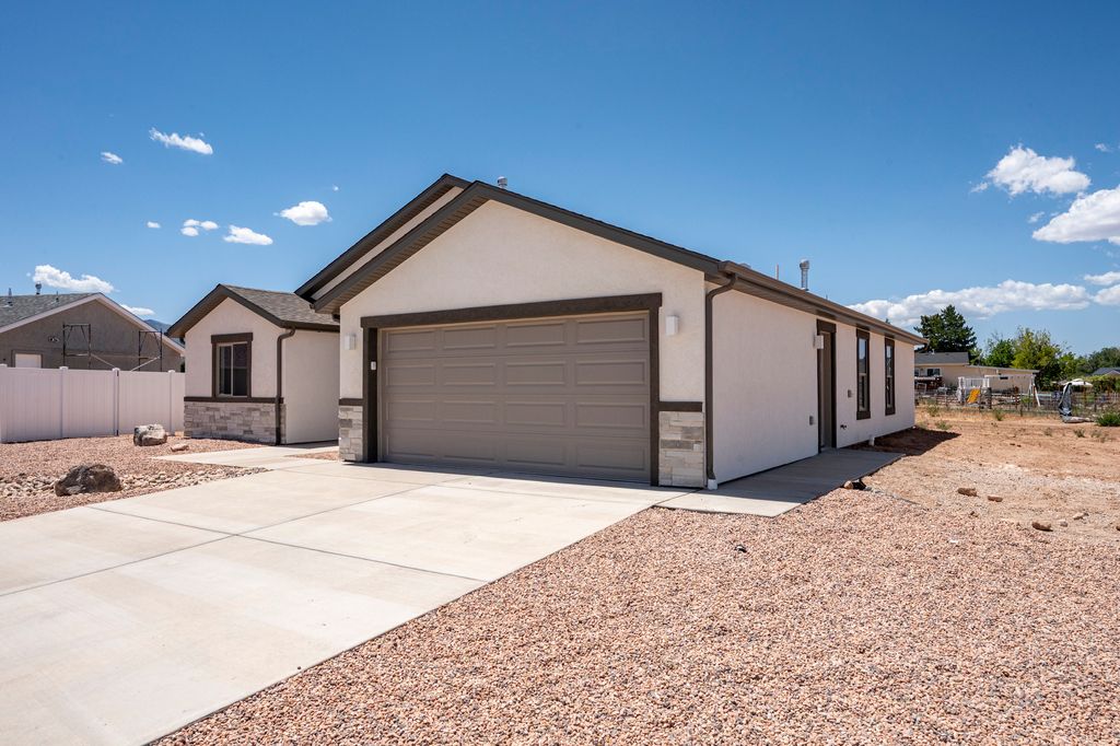 Photo of 3981 N HAWKS LANDING LOOP #26, Enoch, UT 84721 (MLS # 2172385)
