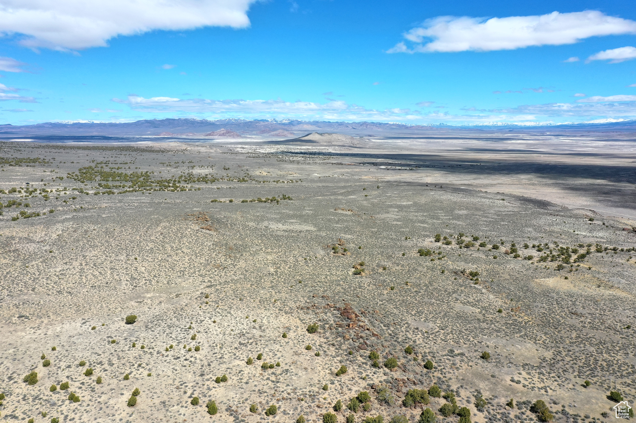 Seller financing or all cash discount! This property is not far from the Utah/Nevada border South of Lucin and about 5 miles West of the Sun Tunnels. To arrive at the property you take Hwy 30 and turn South onto Pilot Mountain Road. About 7 miles you come on Coal Bank Springs Road and follow that for about 2.5 miles. The property is about .25 miles south of Coal Bank Springs Road. There is no road directly to the property but the topography of the area is gentle rolling hills so a 4wd vehicle should be able to drive right up to the property. Along Pilot Mountain Road you see several landmarks, including the Transcontinental Railroad Line, Lucin Pond, and the Sun Tunnels are about 5 miles East of the property. Vegetation on the property includes Sagebrush, Prairie Grass, Wildflowers and Cactus. In the area I have seen rabbits, squirrel, lizards, Elk, Antelope and Deer. The property has great views of the Mountains to the East and the Salt Flats to the south. There are some rock outcroppings on the property. Soil is mostly sandy. There are no visible structures close to the property. There was a farm just north of the Sun Tunnels. The Sun Tunnels is a large - scale art installation. It consists of 4 large concrete cylinders, arranged on the desert floor in a cross pattern, that align with the sunrise and sunset on the summer and winter solstices. In addition to the solar framing, each of the cylinders has smaller holes representing the Draco, Perseus, Columba, and Capricorn constellations. The four concrete tubes act as viewfinders framing precise images which bring the vast space of the desert back to human scale. This would be a great property for someone who wants to be close to the mountains for recreation or wants to live off grid. The nearest towns with partial services are Grouse Creek to the North, and Montello, Nevada to the West. Wendover, Nevada to the south is the nearest town with full services. The property is Zoned Multi-Use 160. Seller has no water rights. No Utilities are in the vicinity. GPS Coordinates: 41.30625 - 113.96056