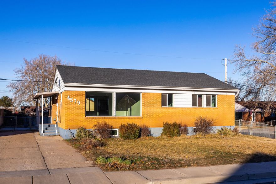 This charming home offers the perfect blend of original character and thoughtful modern updates. The main level has been refreshed while preserving its classic appeal, featuring original hardwood floors and a rare 3-bedroom layout with a larger floor plan than typically found in homes in this area. The updated kitchen and updated bathroom add everyday functionality, while abundant windows fill the home with natural light and frame mountain views. Other recent improvements include a newer HVAC system and select electrical updates, offering added comfort and reliability. The home is also wired for high-speed fiber internet, making it well suited for remote work or modern living. Situated on a desirable corner lot in well-maintained established neighborhood, this home stands out for its space, updates, and timeless appeal.