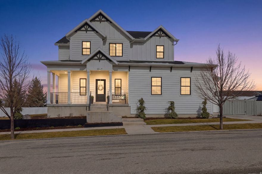 Welcome to this stunning 2017 Parade of Homes featured property located in the highly desirable Mount Sterling Farm subdivision in Hyrum, UT. Perfectly situated on a beautiful lot with breathtaking views in every direction, this home offers an exceptional combination of quality craftsmanship, thoughtful design, and beautiful surroundings. The meticulously maintained landscaping enhances the home's curb appeal and creates a warm and inviting first impression. This residence showcases an array of high-end features throughout. Built with an energy-efficient Zip System, the home offers enhanced durability and energy performance. Upgraded black clad windows add both elegance and quality, while the home's amazing layout provides a spacious and functional flow that is perfect for entertaining and everyday living. The kitchen is equipped with new appliances, making it both stylish and practical for gathering with family and friends. Step outside to enjoy the beautiful covered deck or relax on the charming covered front porch. Both perfect places to take in the incredible mountain and valley views that surround the home. Additional highlights include a spacious 3-car garage and a convenient RV pad, offering plenty of room for vehicles, storage, and recreational toys. With it's Parade of Homes craftsmanship, exceptional layout, and stunning views, this home is a rare opportunity in one of Hyrum's most sought-after neighborhoods. Reach out today to schedule your private showing! Square footage figures are provided as a courtesy estimate only; buyers are advised to obtain an independent measurement.