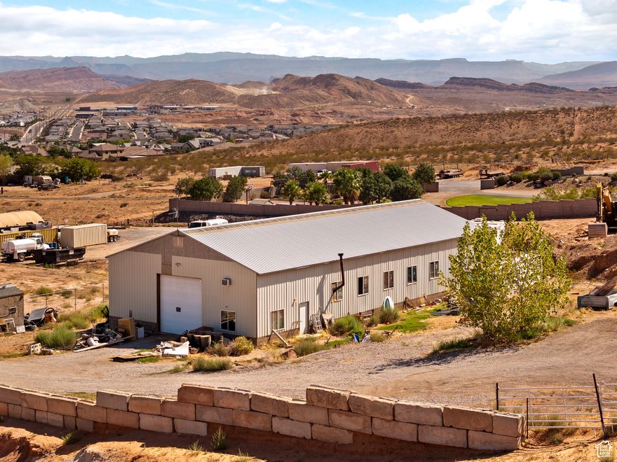 *PRICE ADJUSTMENT, MOTIVATED SELLER!!!* A home, shop, and land all in one, this property is a great investment opportunity. The well-maintained 3-bedroom, 2-bathroom manufactured home sits on a permanent foundation with a crawl space and cement pad for lasting stability. Several important updates have already been completed, including a new furnace, condenser, A/C unit, microwave, dishwasher, and garbage disposal. The metal roof was replaced in 2019 on both the home and the shop, providing durability and low maintenance. The property also features a spacious 3,600 sq ft shop, offering endless possibilities for storage, hobbies, or business use. Water is registered in Cedar City with 5 acres of shared water rights and access to a well conveniently located just behind the neighbor's property.  This property combines comfortable living with valuable workspace and land, making it a unique opportunity for both personal use and long-term investment.