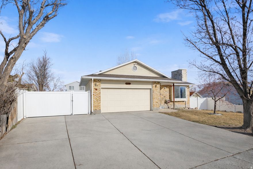 *Open House Saturday January 24th 11am-2pm* This 5-bedroom, 2-bath home stands out for its level of customization, finish quality, and true turnkey condition-features rarely found at this price point in West Jordan. Inside, the home offers new carpet and updated LVP flooring throughout, fresh interior paint, and updated tile in both bathrooms, creating a clean and cohesive look from top to bottom.  The kitchen and living spaces are highlighted by beautiful granite countertops and extensive custom stainless steel cabinetry built specifically for this home, offering both durability and storage that go well beyond typical finishes. Major electrical upgrades throughout the property further enhance the home's functionality and future-ready design.  Outside, enjoy a large RV pad with room for all your toys and a very private backyard framed by mature trees. With a newer roof and countless thoughtful upgrades already completed, this is one of those homes you truly need to see in person to understand and appreciate its value-offering features and customization that are nearly impossible to replicate at this price point.