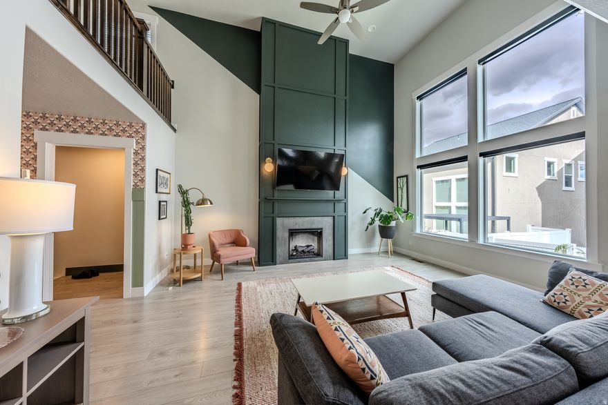 Built in 2018 | 3,624 sq ft | 5 bed, 3.5 bath | Independence Village, Bluffdale This home delivers functional design, genuine community, and a location that puts the entire valley within reach. Finished Basement Professionally finished with a wet bar (sink, storage, counter space), flexible bedroom, and full bath. Built for entertaining, multigenerational living, or whatever your life requires. Hosts holiday gatherings, movie nights, home gym sessions, and craft rooms without compromise. First Floor Open living and dining area with soaring 17-foot ceilings and custom electric fireplace. Library/office with floor-to-ceiling built-ins. Kitchen with large island, 5-burner gas range, and KitchenAid appliances. Mudroom with built-ins to contain the chaos. Powder room for guests. Upstairs Primary suite plus three additional bedrooms and full bath. Loft overlooks the main living space below. Laundry and linen closet conveniently located upstairs. Quiet street where neighbors know each other and kids play outside. Four parks within walking distance, daily-use trails at your doorstep, pickleball courts and splash pad nearby. Jordan River Trail a short drive away. Between I-15 and Mountain View Corridor - less than 30 minutes to Salt Lake City, Silicon Slopes, or Big and Little Cottonwood Canyons. Systems & Inclusions Tankless water heater, water softener, radon mitigation, zoned HVAC damper. $20/month HOA. Fridge, range, microwave, dishwasher, washer, dryer, two TVs, shelving included. Well-maintained, thoughtfully maximized for storage, move-in ready. Occupied but easy to show. Out of state? Request the 3-D tour link.