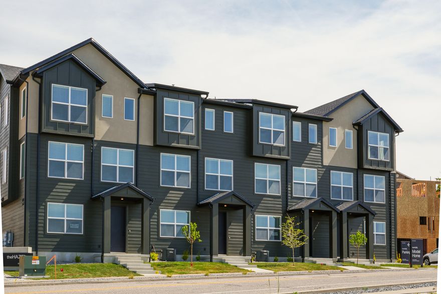 Welcome to theHAZEL! Roy's newest modern townhome community! This interior unit offers a thoughtfully designed 3-bedroom, 2.5-bath layout with open-concept living and contemporary finishes throughout. Enjoy a spacious kitchen, functional multi-level design, and an attached 2-car garage. This home is fully move-in ready, including a washer and dryer, refrigerator, and more. Conveniently located adjacent to the FrontRunner station, theHAZEL provides easy access to commuting, dining, shopping, and everyday essentials. Experience low-maintenance living with style and comfort in one of Roy's most exciting new communities.