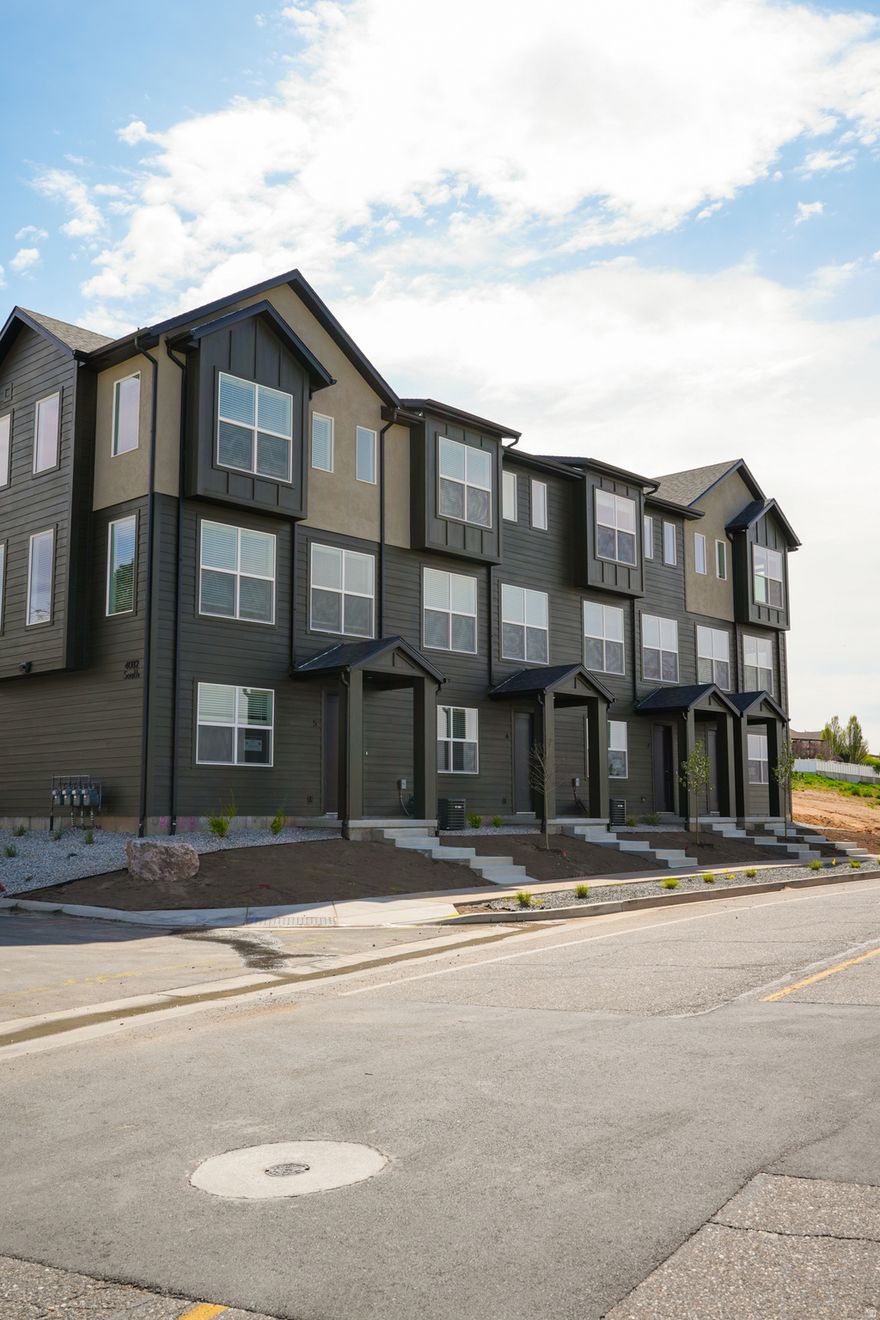 Grand opening this Saturday April 18th. Welcome to theHAZEL! Roy's newest modern townhome community! This interior unit offers a thoughtfully designed 3-bedroom, 2.5-bath layout with open-concept living and contemporary finishes throughout. Enjoy a spacious kitchen, functional multi-level design, and an attached 2-car garage. This home is fully move-in ready, including a washer and dryer, refrigerator, and more. Conveniently located adjacent to the FrontRunner station, theHAZEL provides easy access to commuting, dining, shopping, and everyday essentials. Experience low-maintenance living with style and comfort in one of Roy's most exciting new communities. Grand opening this Saturday April 18th - come and ask about our lender incentives.