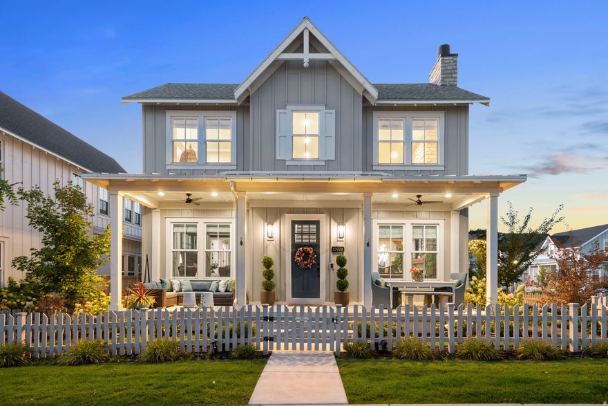 MOTIVATED SELLER! Rare opportunity to own a stunning home on the Exclusive Island at Daybreak. Luxurious features include soaring 20-foot ceilings and a striking stone fireplace in the great room, high end Thermador and Cafe appliances in the gourmet kitchen, and custom solid wood trim throughout. The main-floor primary suite offers convenient single-level living while flexible spaces can be converted to fifth and sixth bedrooms as needed. Relax in the beautifully landscaped yard on one of the Island's larger corner lots, framed by a timeless picket fence and featuring an enclosed patio with hot tub, a pergola with gas firepit, climbing grapevines, and raised garden boxes. The fully finished, insulated, oversized three-car garage with 10-foot doors provides extra space and convenience. Just steps from Oquirrh Lake, you will enjoy paddleboarding, kayaking, and evening strolls, along with access to all of Daybreak's amenities-five swimming pools, indoor courts, gym, track, 50+ miles of trails, dozens of parks, and included high-speed fiber internet. Explore the Matterport 3D tour and schedule your private showing today!