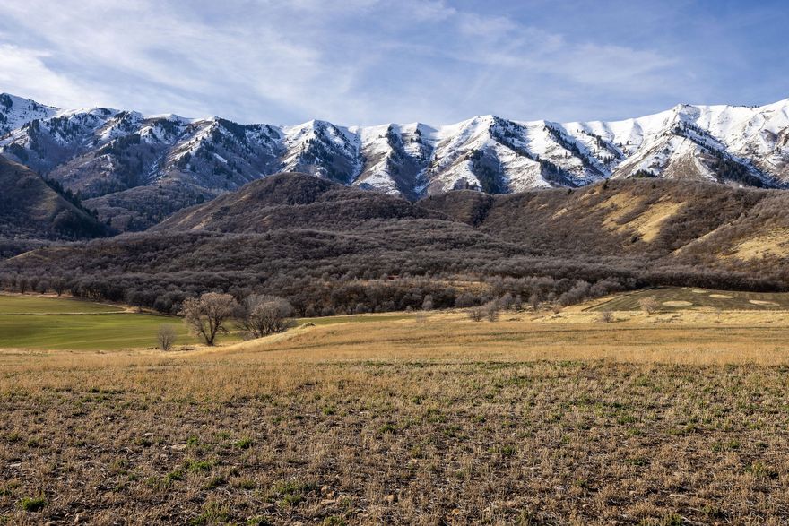 Experience 56 stunning acres on Mendon's coveted west bench. Where sweeping views and open skies create an unforgettable setting. With easy access, this exceptional property offers endless potential in one of Cache Valley's most beautiful locations. Currently used as dry farm alfalfa.  Buyer to verify all information.